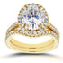 Oval Moissanite and Halo Diamond Bridal Set 3 3/5 CTW in 14k Yellow Gold